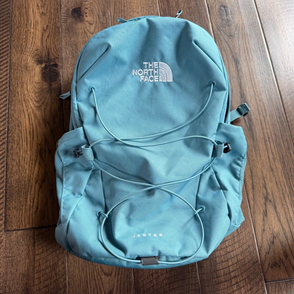 The North Face Jester Backpack Teal Blue Laptop Sleeve Bungee Hiking Bag